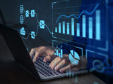 Epidemiologist working with Data Management System on computer to make report with metrics connected to database - stock photo