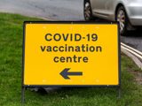 COVID 19 Vaccination Centre directional sign